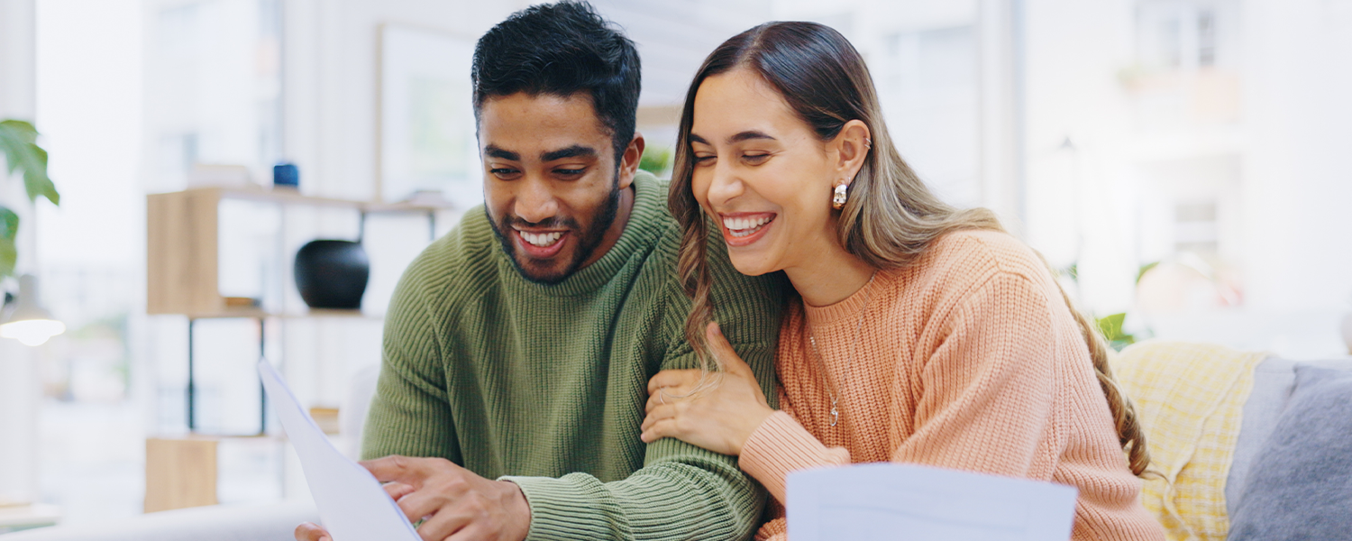 Man and woman reading a document